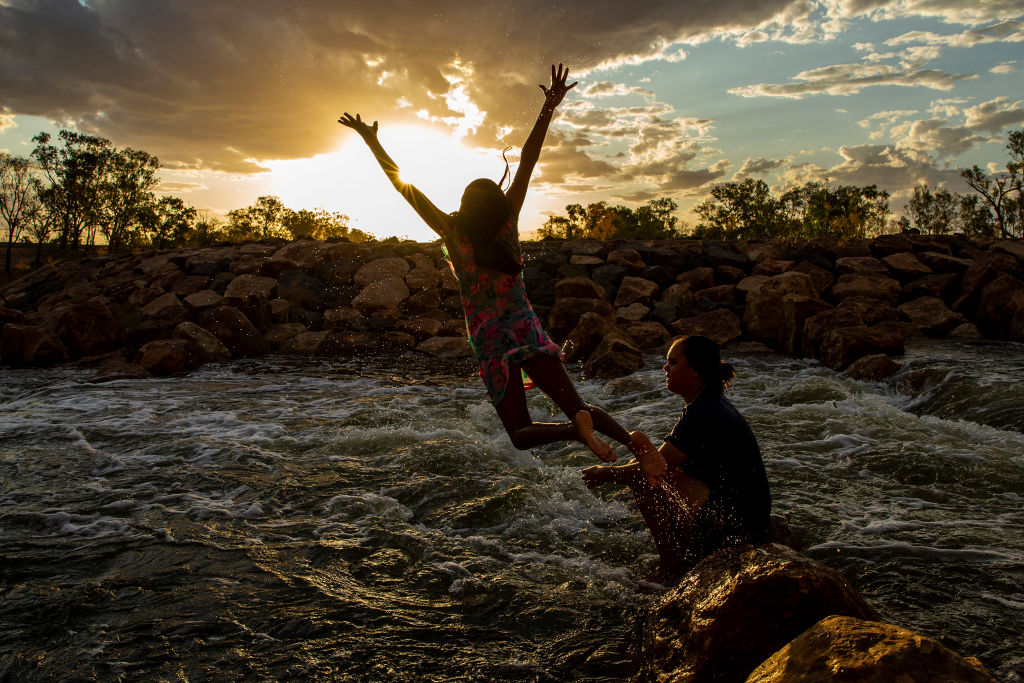 children playing in river