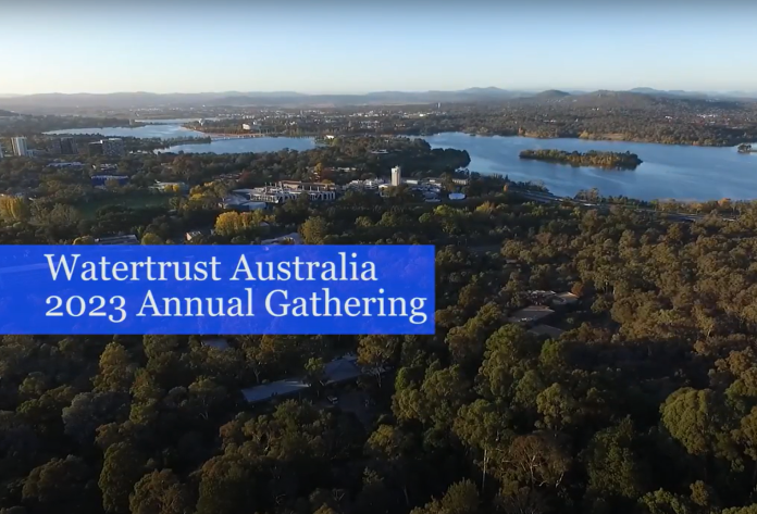 Aerial photo of Canberra with title text "Watertrust Australia 2023 Annual Gathering"